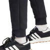 Manchester United FC Essentials Trefoil Tracksuit Pants 2023/24 | EvangelistaSports.com | Canada's Premiere Soccer Store