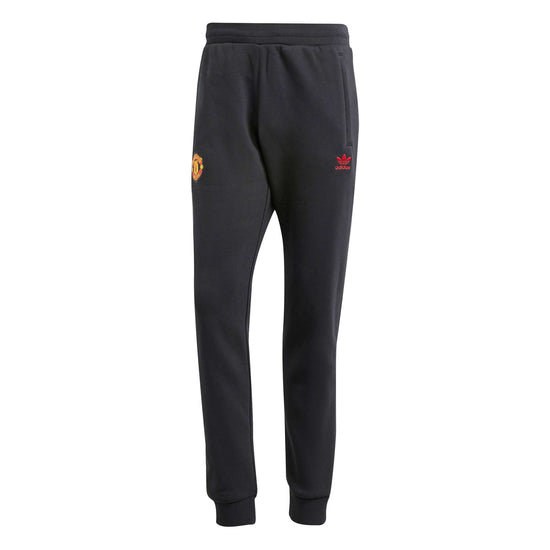 Manchester United FC Essentials Trefoil Tracksuit Pants 2023/24 | EvangelistaSports.com | Canada's Premiere Soccer Store